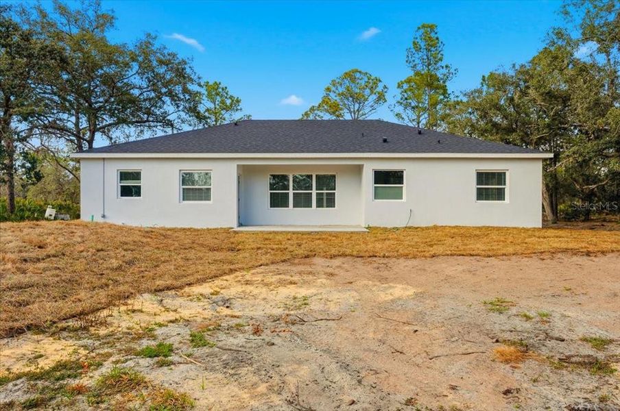 Exterior details and patio area of a home in , Indian Lake Estates (Image 19).
