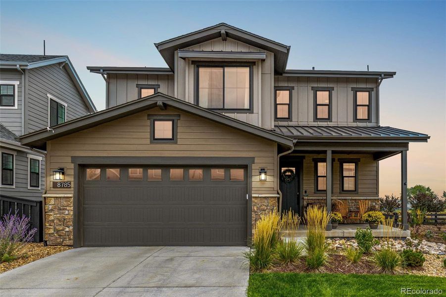 Front exterior of a new home in , Littleton, CO, highlighting curb appeal (Image 1). Front exterior of a new home in , Littleton, CO, highlighting curb appeal (Image 1).