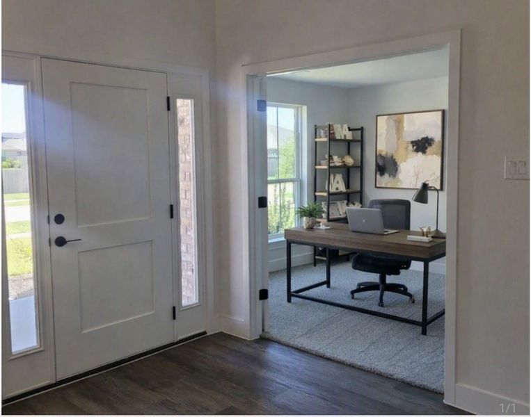 Fantastic office located at the front and enterance . Staged photo Fantastic office located at the front and enterance . Staged photo