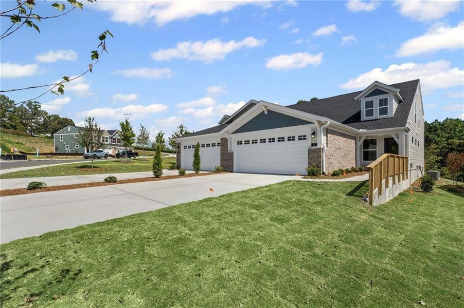 Front exterior of a new home in Villas at Gold Creek, Dawsonville, GA, highlighting curb appeal (Image 20).