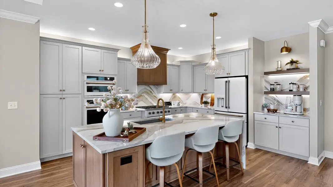Representative furnished interior of a home built from the Salerno by Perfection Builders in The Courtyards at Oakland Hills, Louisville (Image 6).
