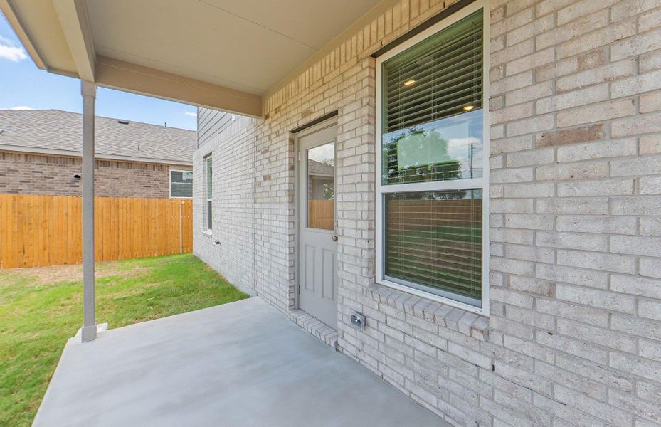 Exterior details and patio area of a home in Crosswinds, Kyle (Image 3).