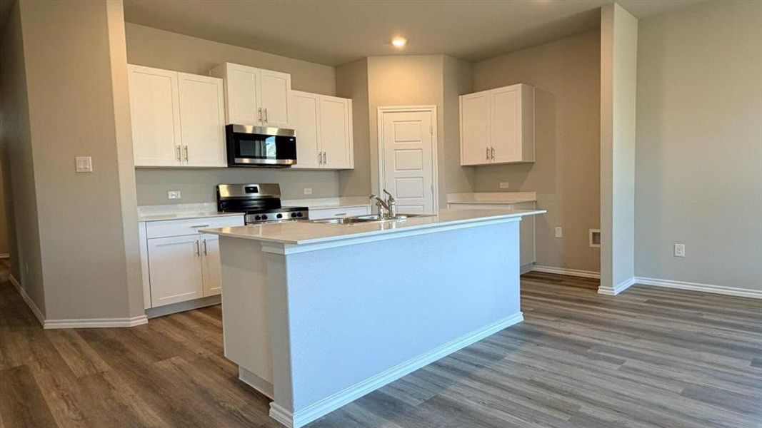 Kitchen - All Home and community information, including pricing, included features, terms, availability and amenities, are subject to change at any time without notice or obligation. All Drawings, pictures, photographs, video, square footages, floor plans, elevations, features, colors and sizes are approximate for illustration purposes only and will vary from the homes as built. Kitchen - All Home and community information, including pricing, included features, terms, availability and amenities, are subject to change at any time without notice or obligation. All Drawings, pictures, photographs, video, square footages, floor plans, elevations, features, colors and sizes are approximate for illustration purposes only and will vary from the homes as built.