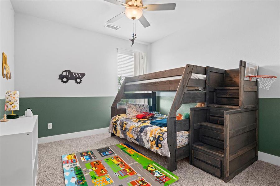 A secondary bedroom with plenty of space for a bunk bed.