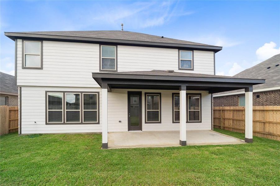 Come and see this spacious backyard with its beautiful covered patio. There is plenty of room for the kids to play and adults to relax!