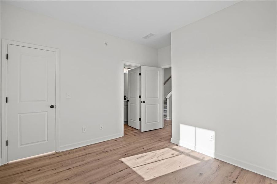 Spacious, unfurnished interior of a new home in The Village at River Green, Canton (Image 27).
