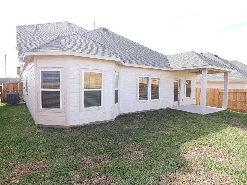 Exterior details and patio area of a home in Lone Star Landing, Montgomery (Image 3).