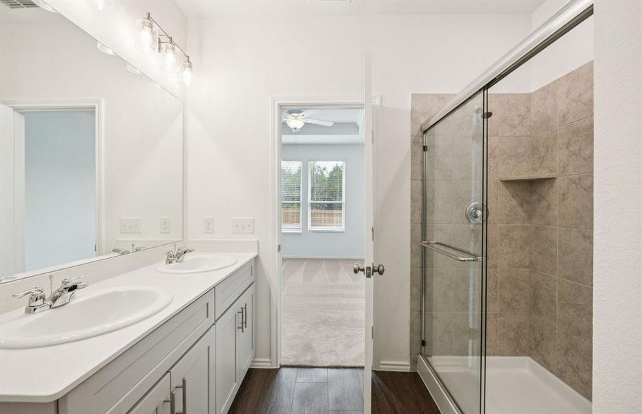 Spacious owner's bath with ample cabinet storage Spacious owner's bath with ample cabinet storage