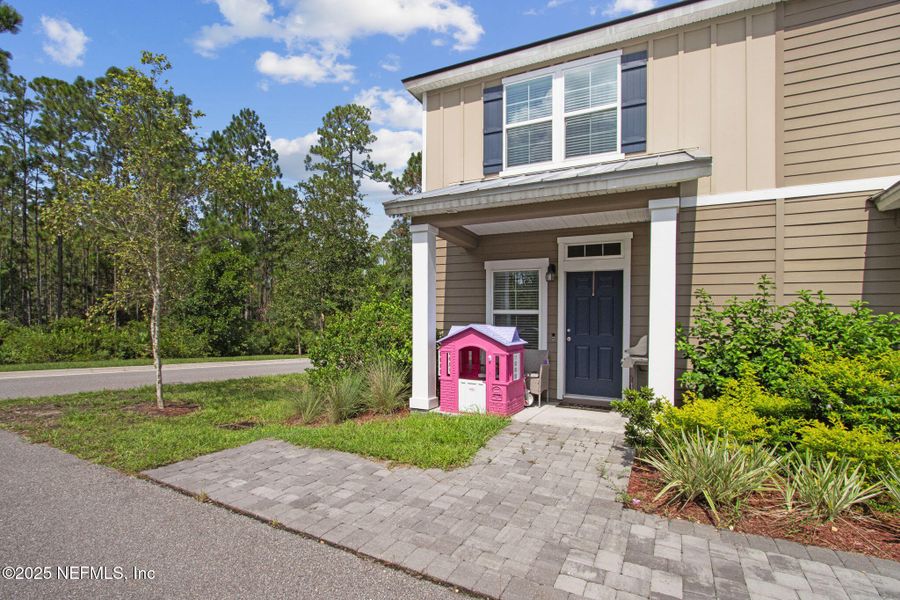 Front exterior of a new home in , Yulee, FL, highlighting curb appeal (Image 19).