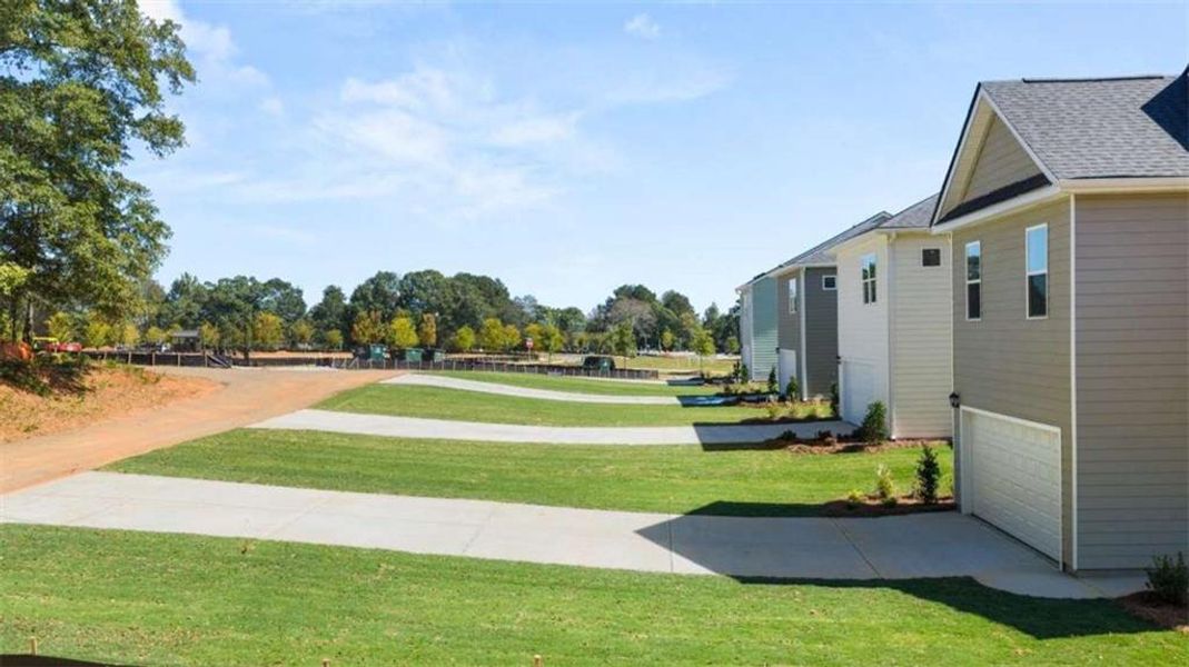 Exterior details and patio area of a home in Brookland Commons, Monroe (Image 26).