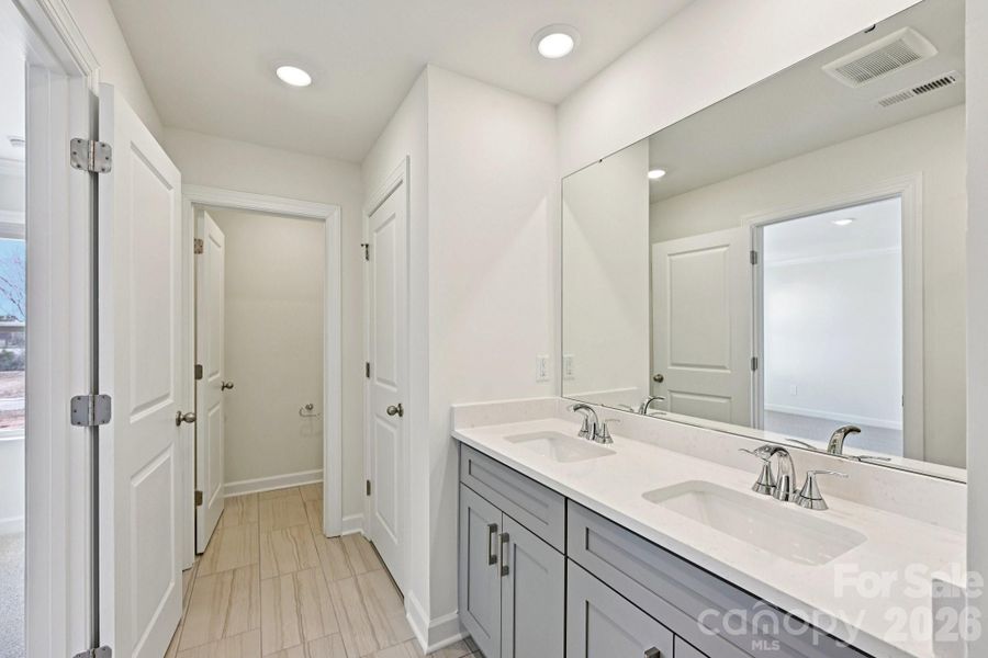 Furnished interior view inside a new home in Meadows at Wilson Farms - The Summit Series, Fort Mill (Image 8). Furnished interior view inside a new home in Meadows at Wilson Farms - The Summit Series, Fort Mill (Image 8).