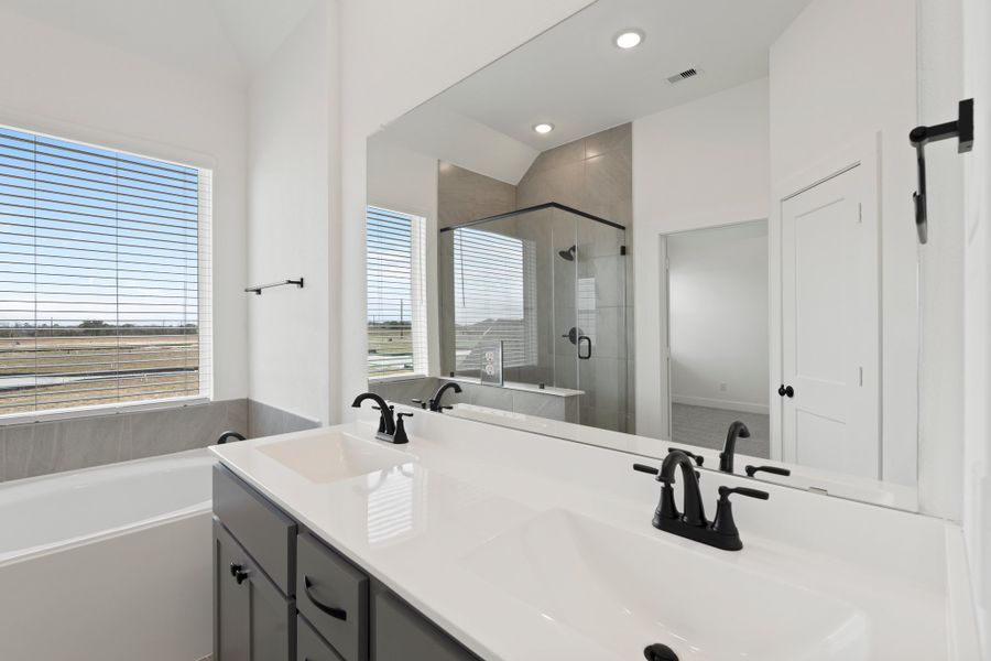 Furnished interior view inside a new home in Bridgeland, Cypress (Image 10).