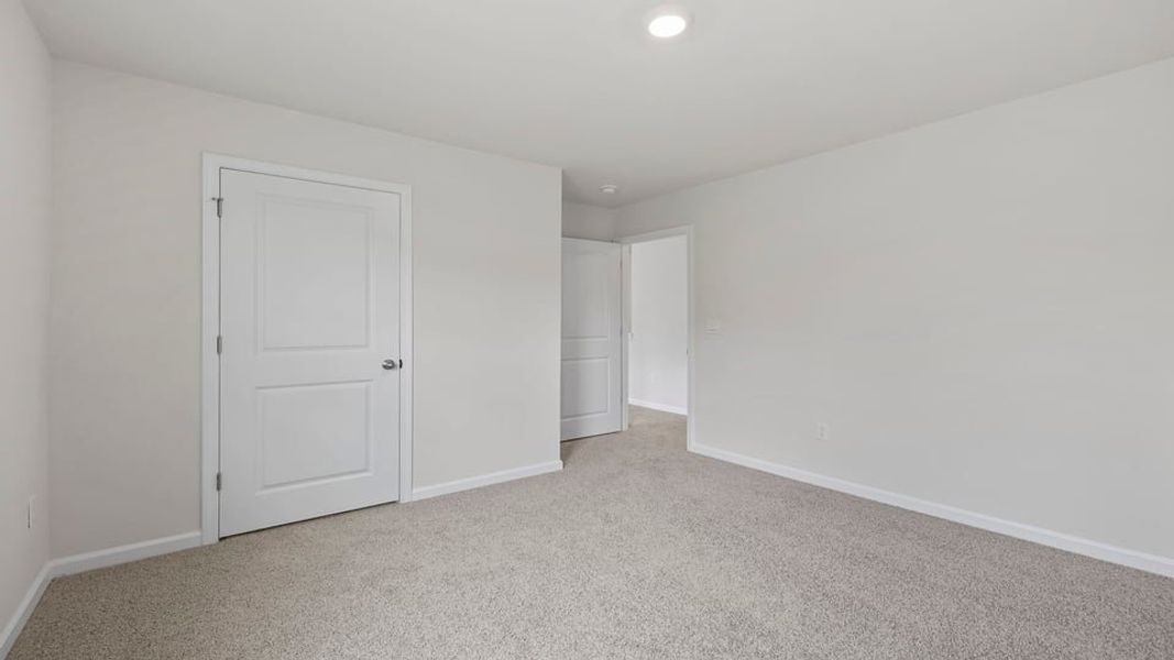 Spacious, unfurnished interior of a new home in Hunters Ridge, Woodruff (Image 31).