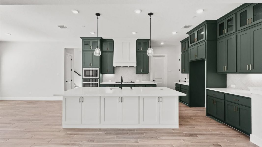 Representative furnished interior of a home built from the Raegan by Chesmar Homes in Sweetwater, Austin (Image 6). Representative furnished interior of a home built from the Raegan by Chesmar Homes in Sweetwater, Austin (Image 6).