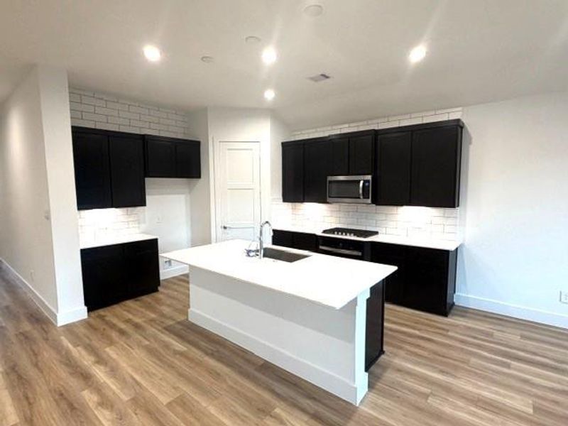 Furnished interior view inside a new home in Hills of Westlake, Conroe (Image 4).
