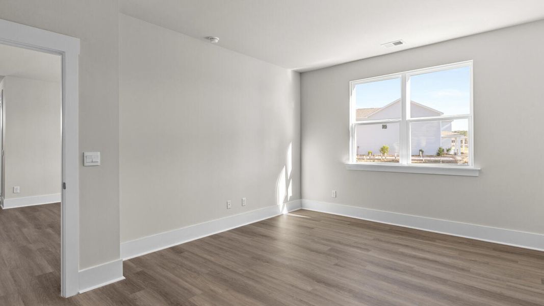 Spacious, unfurnished interior of a new home in Indigo Preserve, Leland (Image 23).