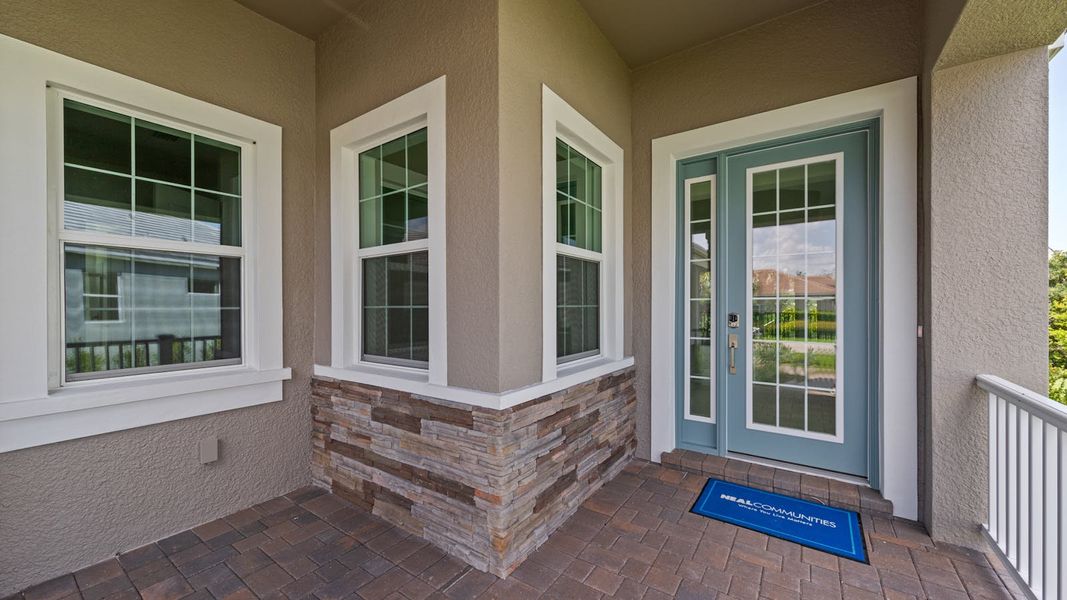 Exterior details and patio area of a home in Verandah Real Estate and Homes for Sale in Fort Myers, FL - Neal Communities, Fort Myers (Image 3).