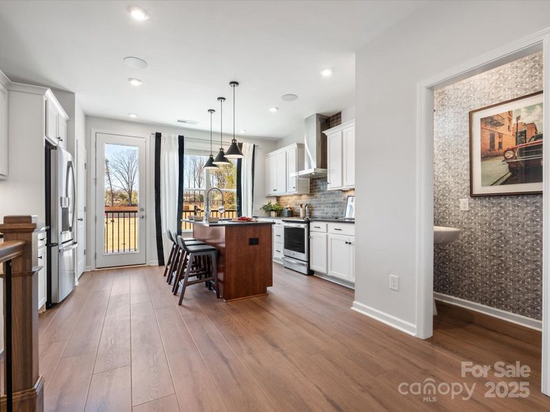 Collins Kitchen & Half Bath | Southmont *actual finishes, color scheme, orientation vary on this home. Furniture not included