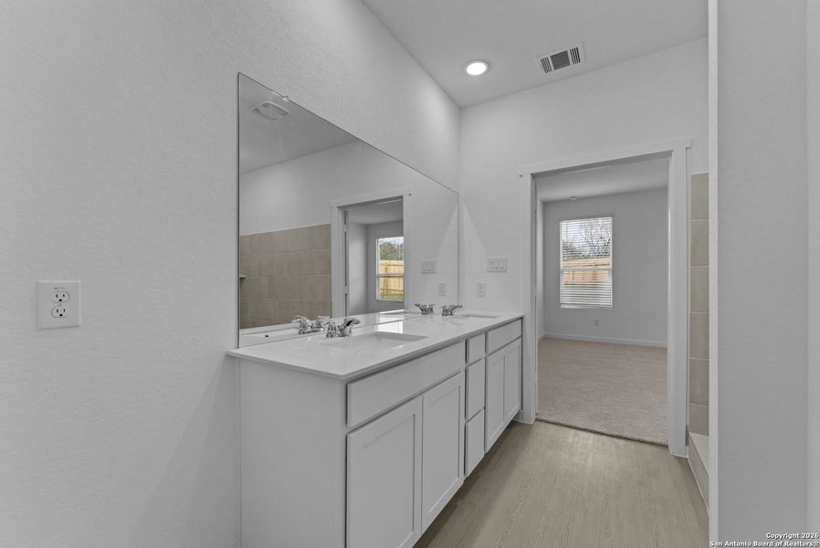 Furnished interior view inside a new home in , New Braunfels (Image 7).