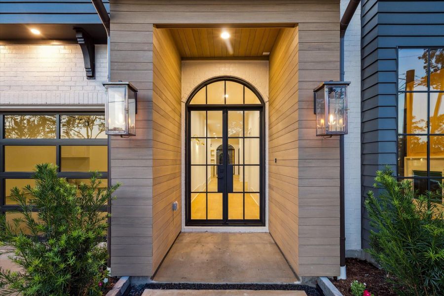 Front entry makes a statement *Picture is of a recently constructed home by the builder.  1519 Candlelight will be similar in quality, but these pictures are not meant to be an exact representation of the new home. Specs of home may change at sole discretion of the seller.