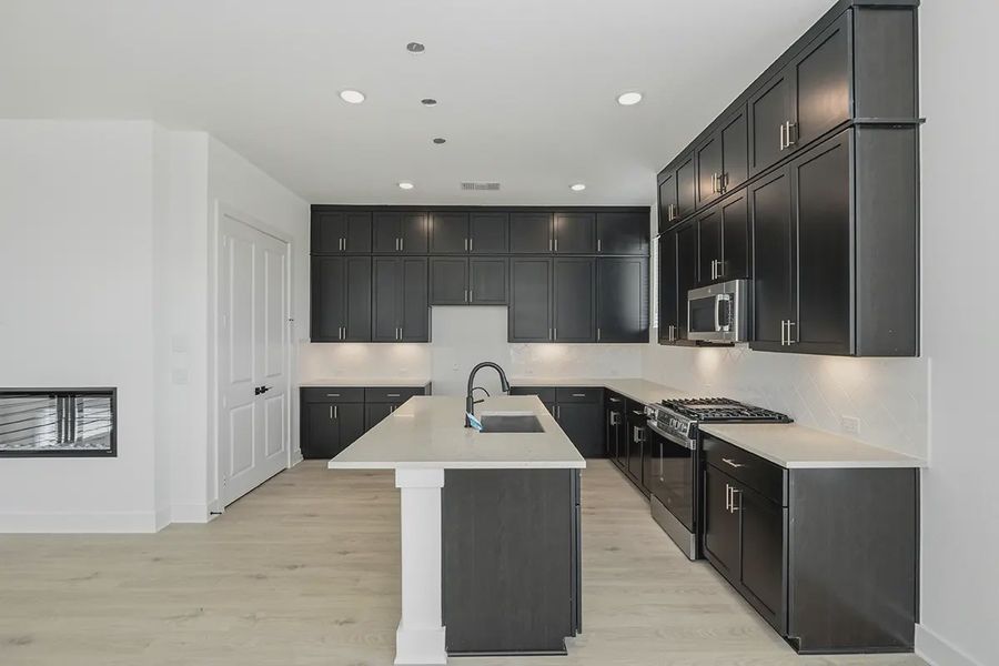Representative furnished interior of a home built from the Athena by Chesmar Homes in Prominence Urban, San Antonio (Image 8).