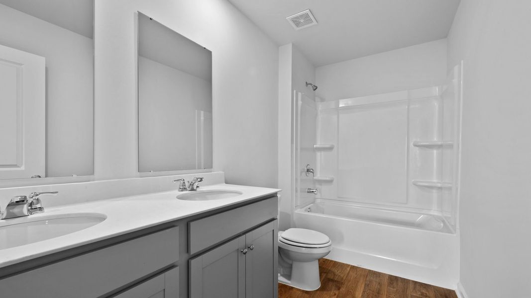 Representative furnished interior of a home built from the ROBIE by D.R. Horton in Hillcrest, Ravenel (Image 11).