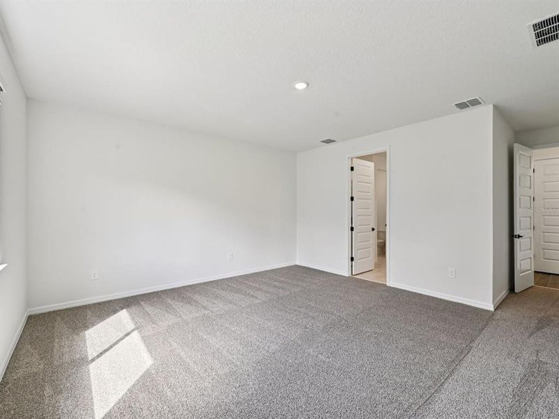 Spacious, unfurnished interior of a new home in Oakfield Trails - Premier Series, Parrish (Image 18).