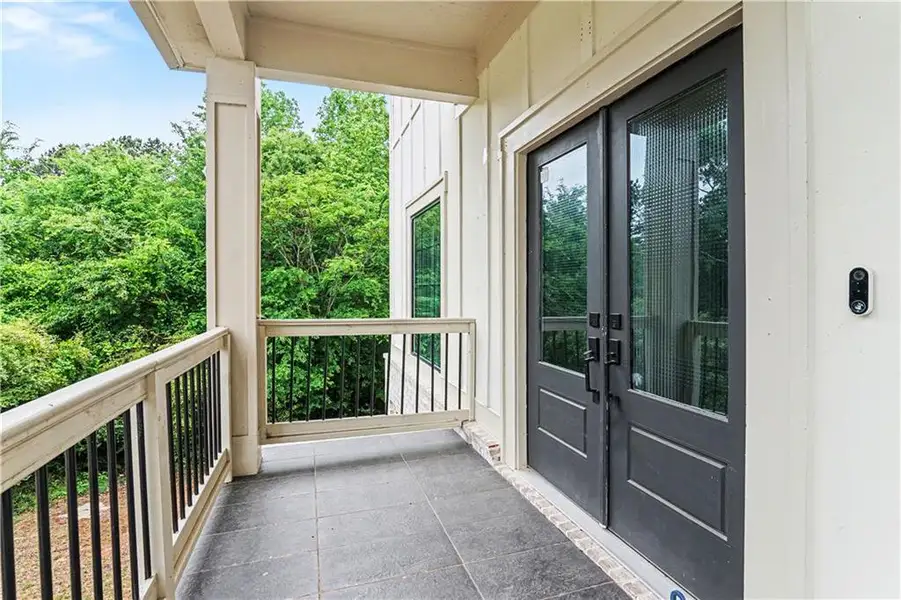 Exterior details and patio area of a home in , Loganville (Image 31).