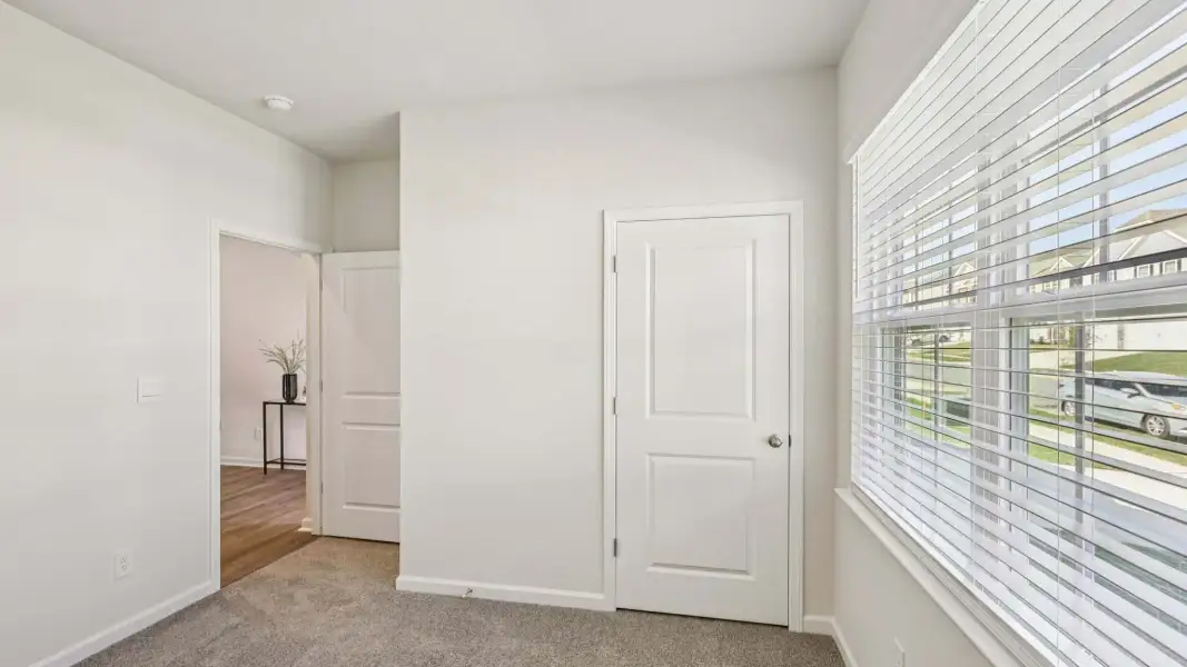 Representative unfurnished interior of a home built from the Cali by D.R. Horton in Sweetwater Village, Rockwell (Image 20).
