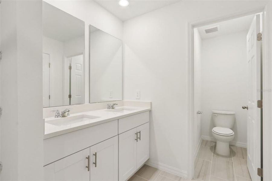 Furnished interior view inside a new home in The Meadow at Crossprairie Townes, St. Cloud (Image 14).