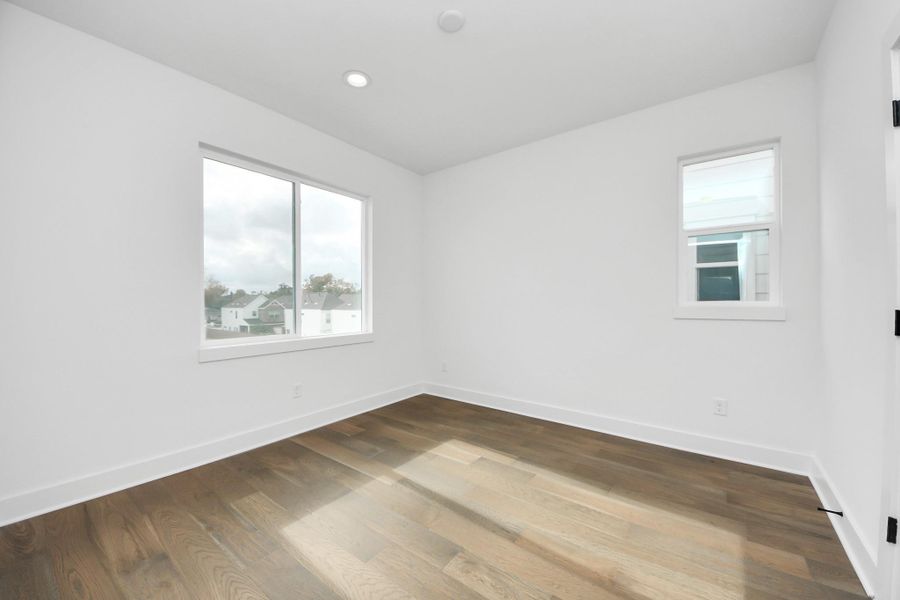 Spacious, unfurnished interior of a new home in Yale Terrace, Houston (Image 23).