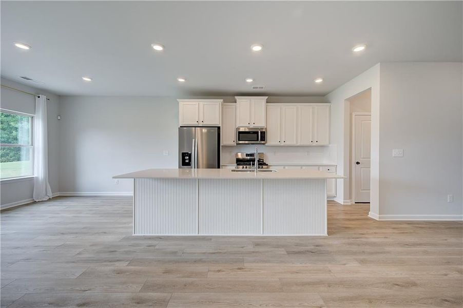Furnished interior view inside a new home in Traditions at Crystal Lake, Hampton (Image 8). Furnished interior view inside a new home in Traditions at Crystal Lake, Hampton (Image 8).