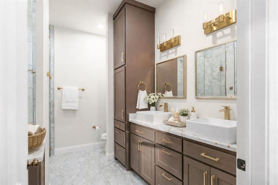 Staged image of the primary bathroom Staged image of the primary bathroom