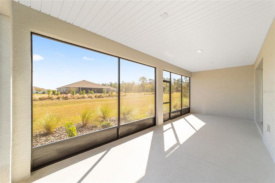 Exterior details and patio area of a home in On Top of the World Communities, Ocala (Image 3).