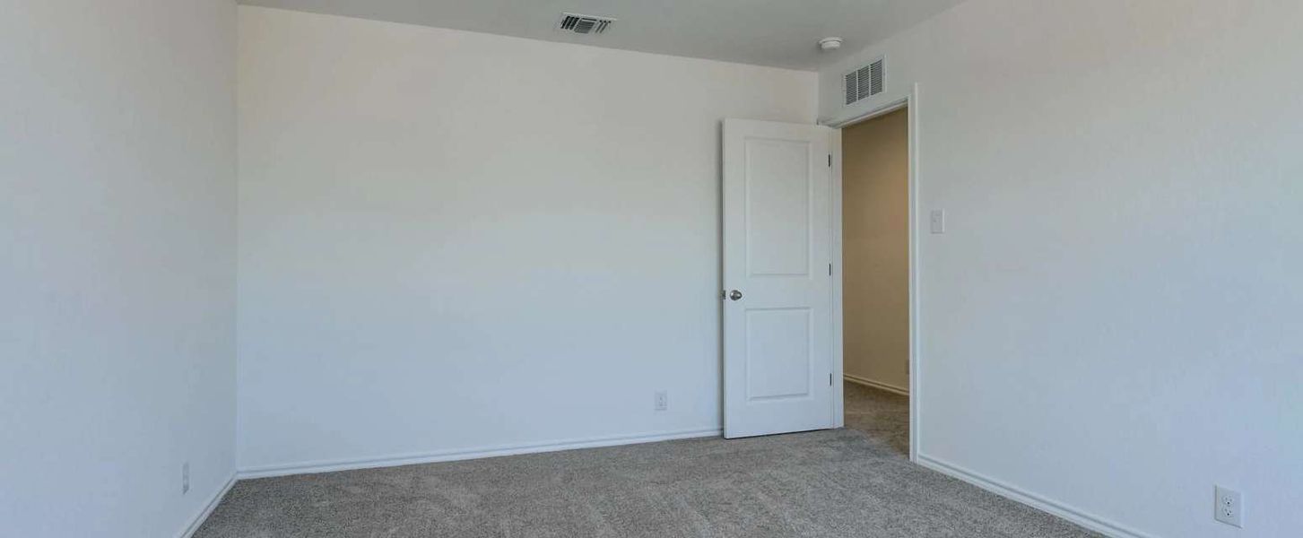 Representative unfurnished interior of a home built from the Dunlap by Ashton Woods in Meadows at Hennersby Hollow 40's, San Antonio (Image 18).