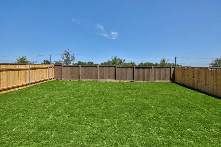 Front exterior of a new home in Overlook Ranch, Georgetown, TX, highlighting curb appeal (Image 1). Front exterior of a new home in Overlook Ranch, Georgetown, TX, highlighting curb appeal (Image 1).