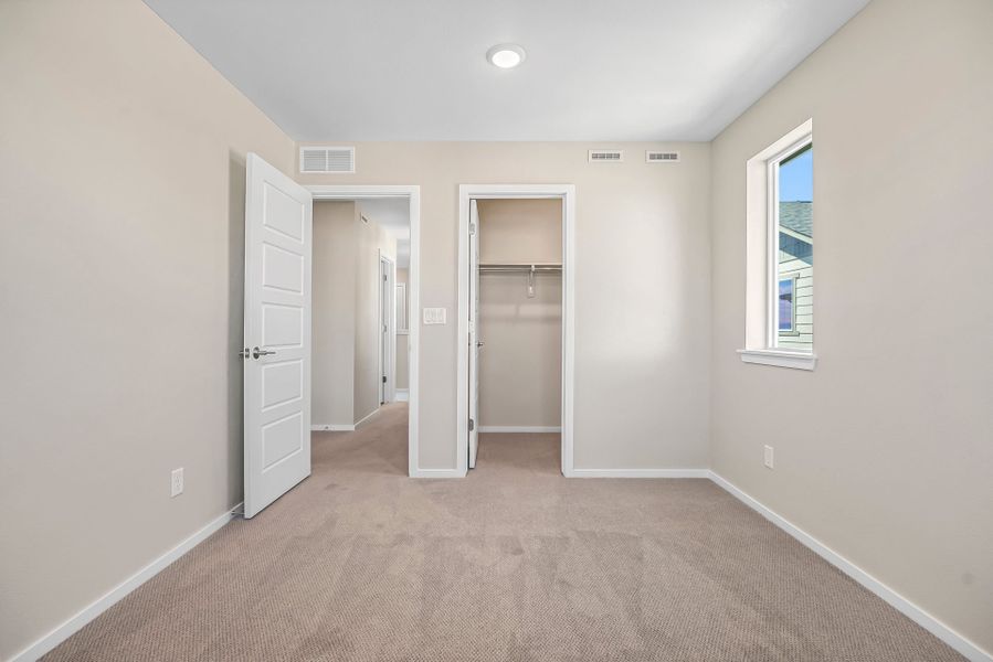 Spacious, unfurnished interior of a new home in Barefoot Village, Firestone (Image 14).