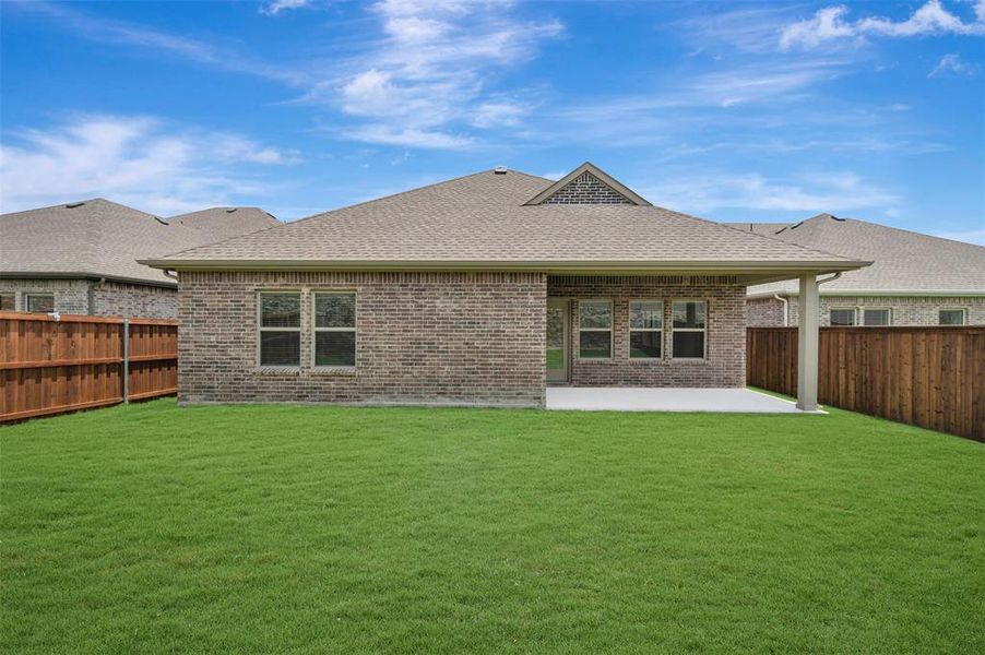 Exterior details and patio area of a home in Aspire at Reunion, Newark (Image 3). Exterior details and patio area of a home in Aspire at Reunion, Newark (Image 3).