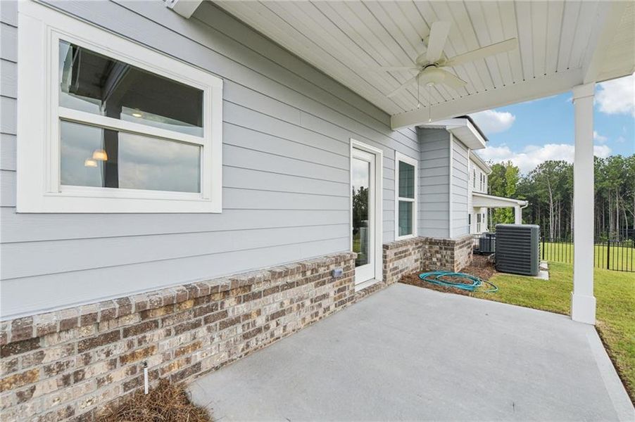 Exterior details and patio area of a home in The Hills at Cedar Creek, Winder (Image 4).