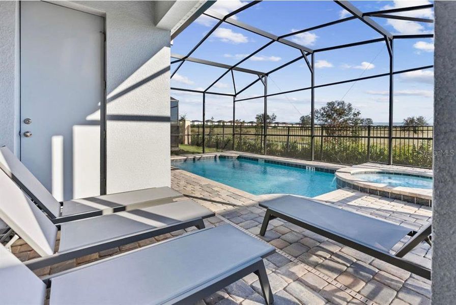 Exterior details and patio area of a home in Solara Resort, Kissimmee (Image 3). Exterior details and patio area of a home in Solara Resort, Kissimmee (Image 3).