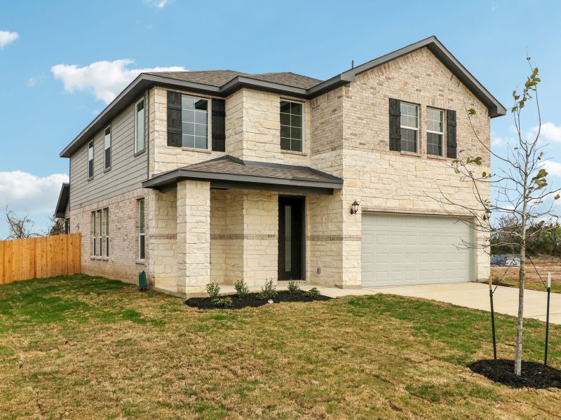 Front exterior of a new home in Royal Crest, San Antonio, TX, highlighting curb appeal (Image 21).