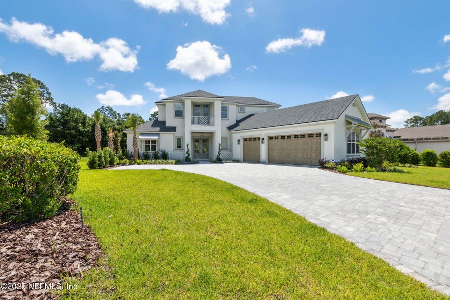 Front exterior of a new home in , Fernandina Beach, FL, highlighting curb appeal (Image 21).