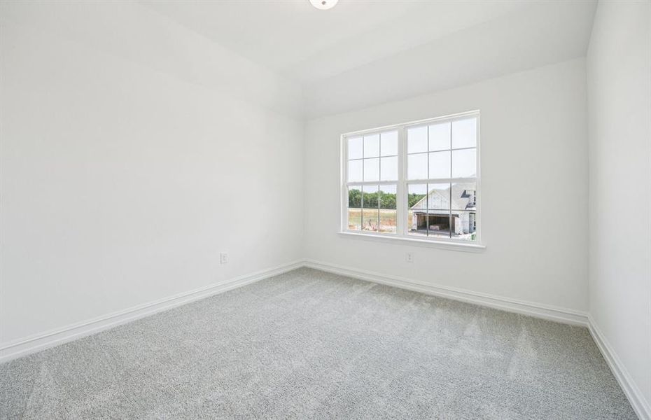 Roomy secondary bedroom with extensive closet storage *Real home pictured Roomy secondary bedroom with extensive closet storage *Real home pictured