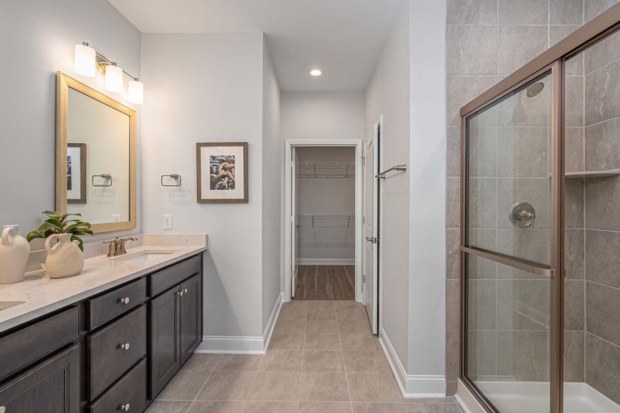 Owner's bath with quartz countertops and double bowl undermount sinks