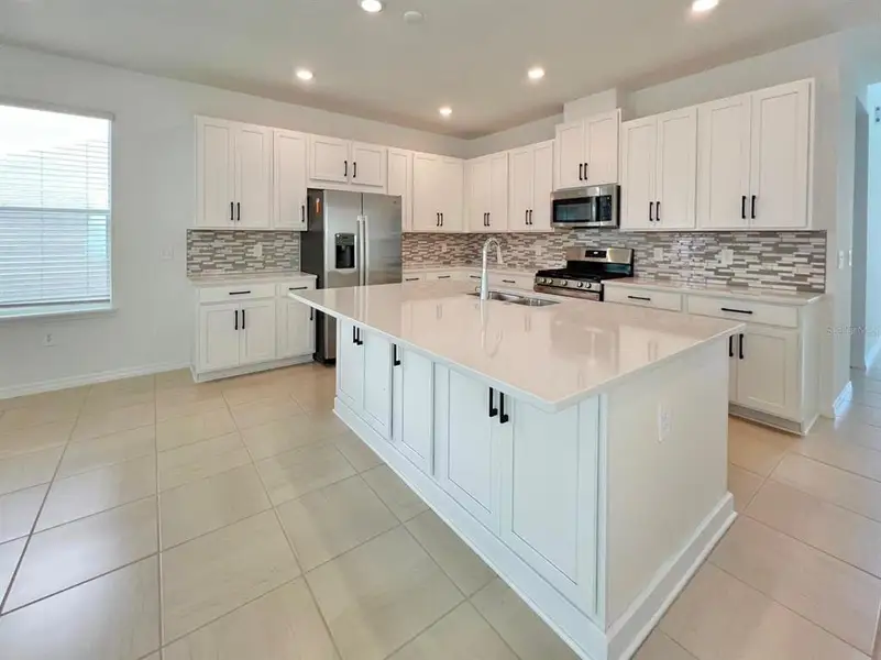 Furnished interior view inside a new home in , Winter Garden (Image 5).
