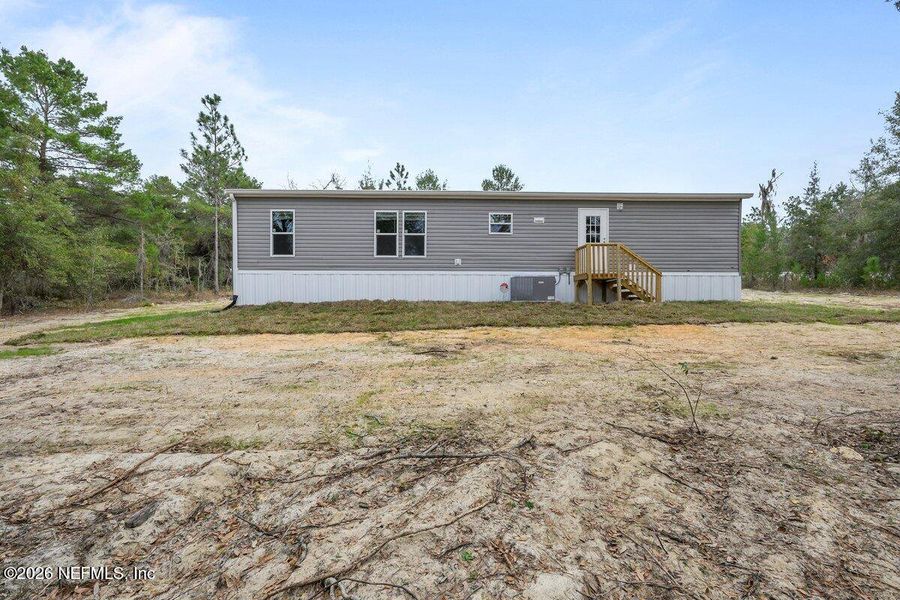 Exterior details and patio area of a home in , Hawthorne (Image 21).