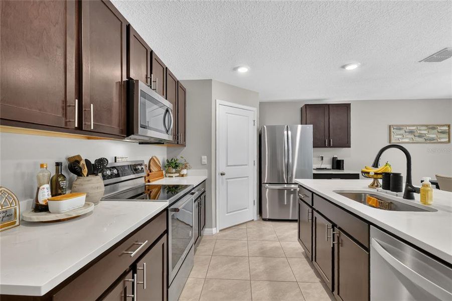 Furnished interior view inside a new home in Sunset Hills, Summerfield (Image 10).