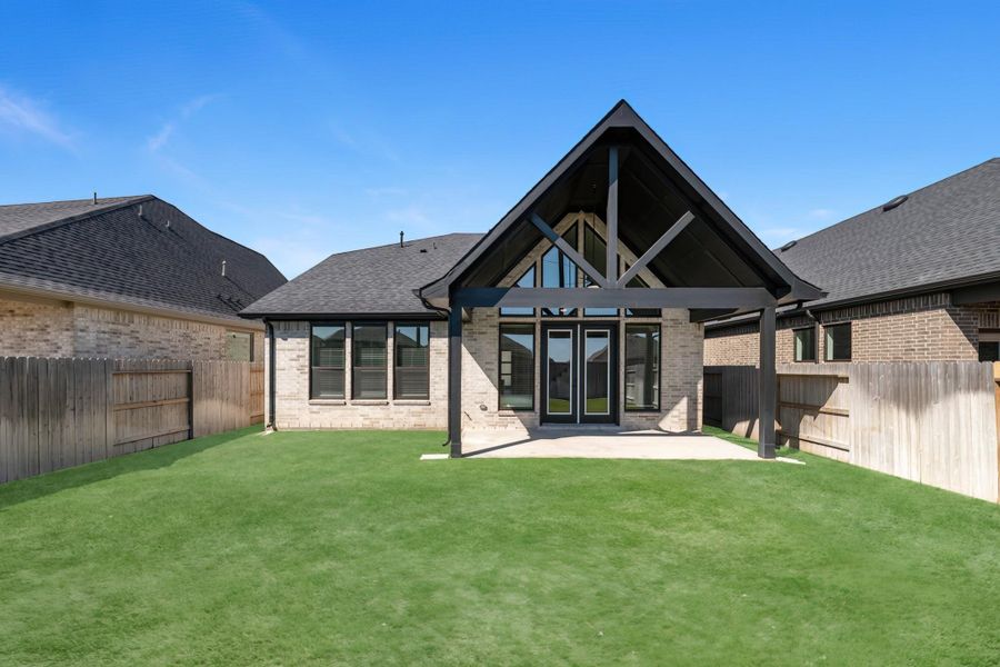 Exterior details and patio area of a home in Audubon, Magnolia (Image 3).