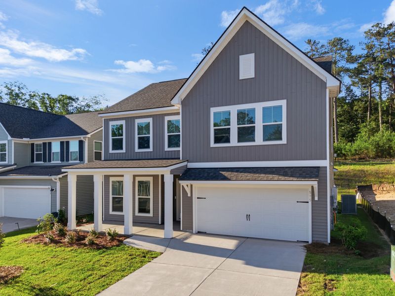 Front exterior of a new home in Grand Arbor, Blythewood, SC, highlighting curb appeal (Image 20).
