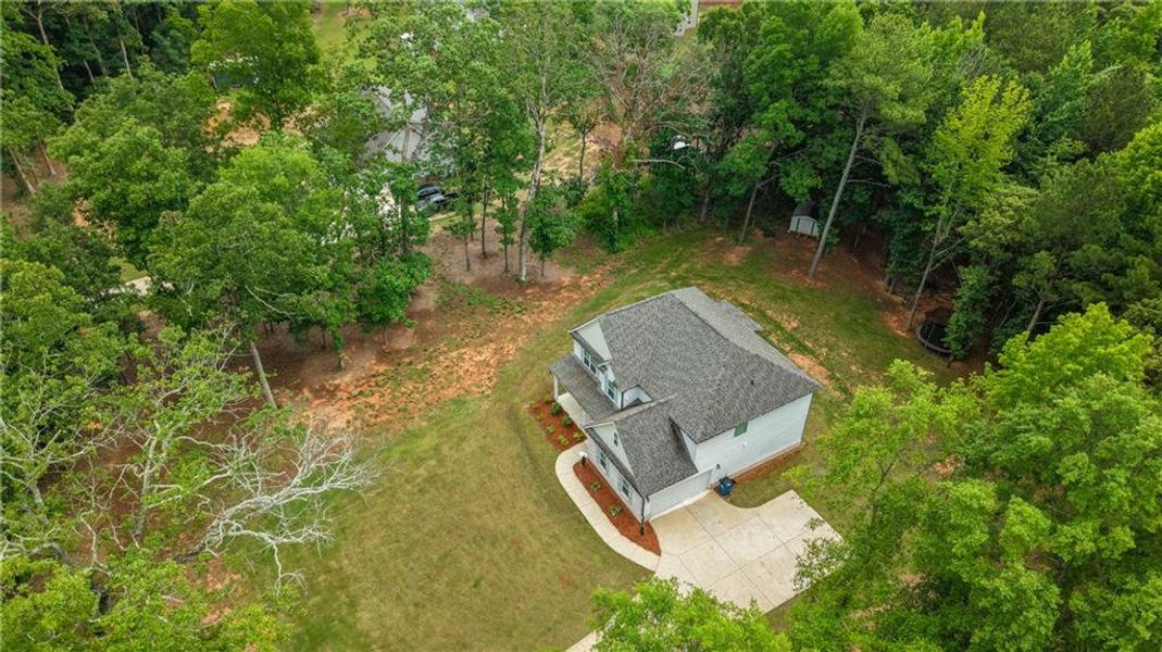 Front exterior of a new home in , McDonough, GA, highlighting curb appeal (Image 30).